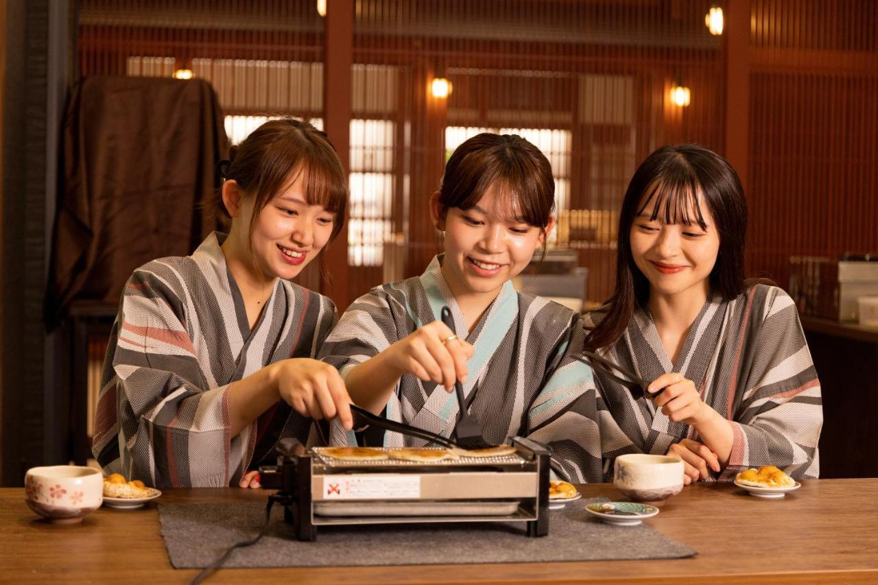 Yamanakaonsen Ohanami Kyubei Kaga  Bagian luar foto